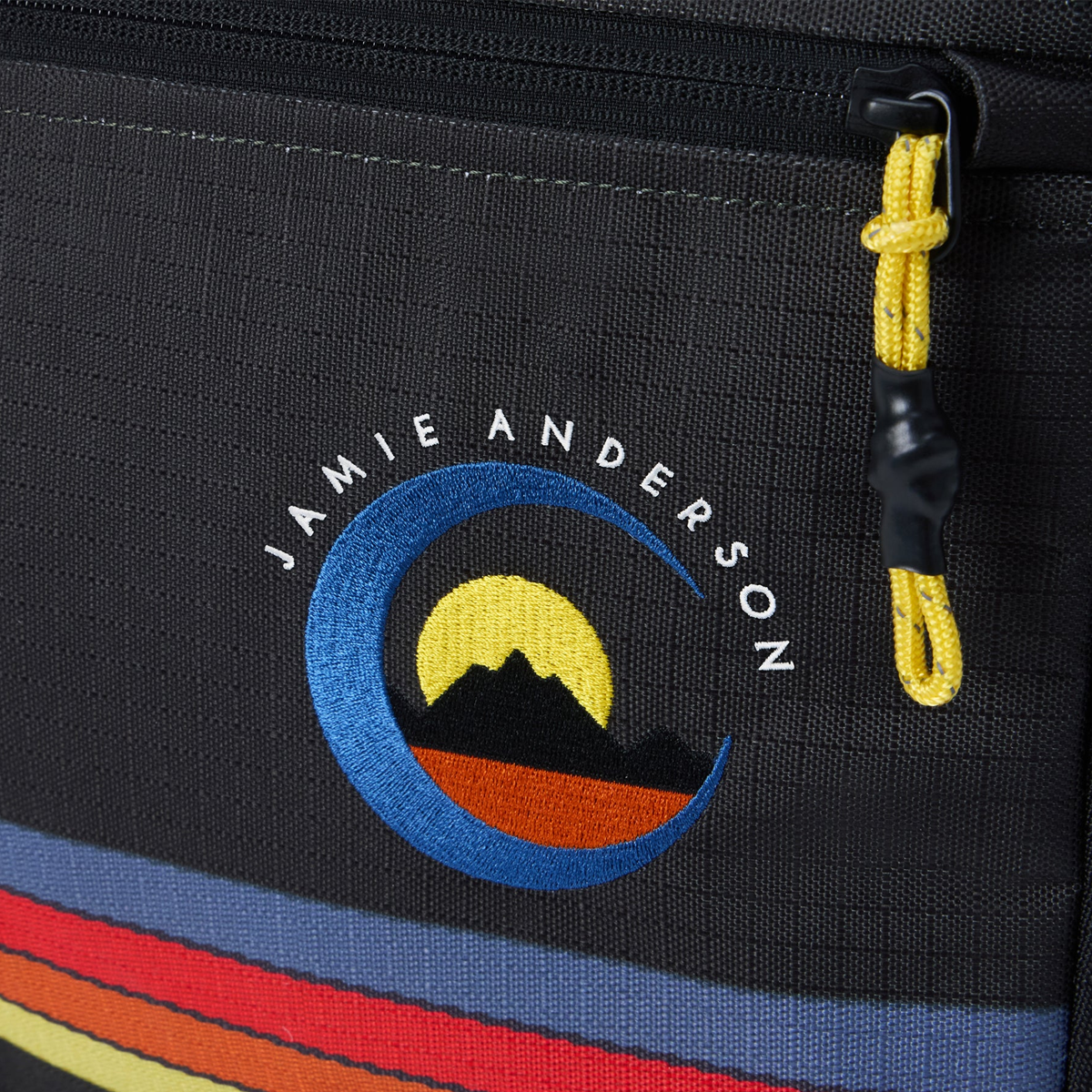 DaKine Team Low Roller Jamie Anderson in Anderson Stripes embroidered and zipper detail