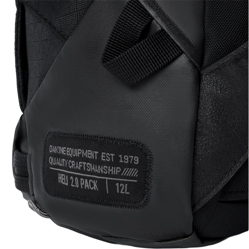 DaKine Heli 2.0 Backpack 12L in Black with logo patch detail