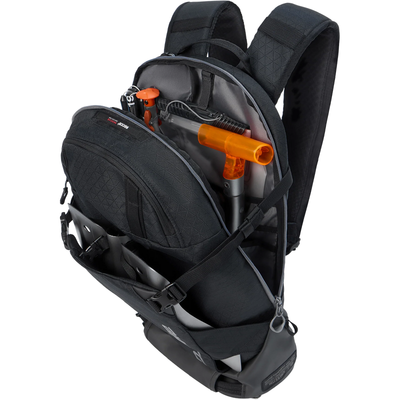 DaKine Heli 2.0 Backpack 12L in Blacksnow tools sleeves in main compartment