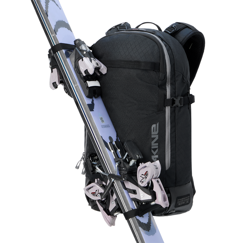 Dakine Heli 2.0 Pro Backpack ski's strapped on front 