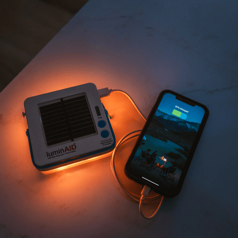 LuminAID Multi-Color Solar String Light, LuminAid Multi-Color Solar String Light charging phone