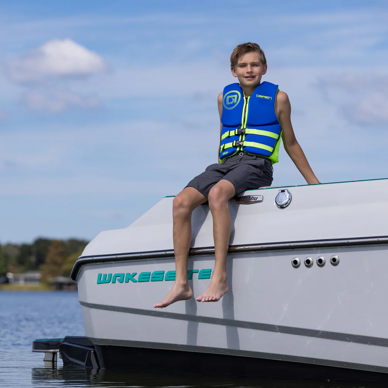 Youth Traditional Life Jacket, O'Brien Youth Traditional Life Jacket in Blue Green on model