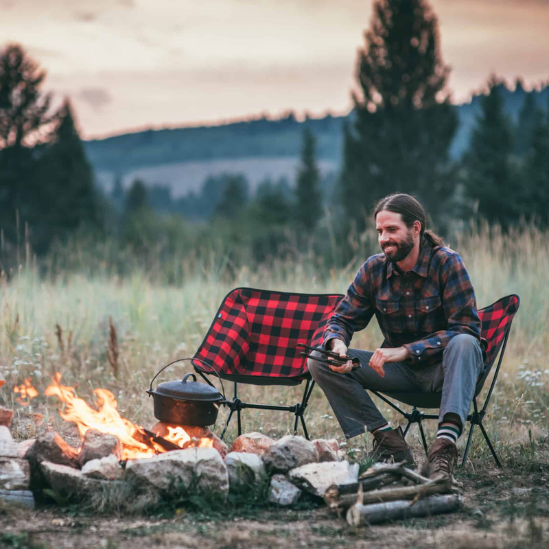 C-Series Joey Buffalo Plaid, TravelChair C-Series Joey Buffalo Plaid in field with model