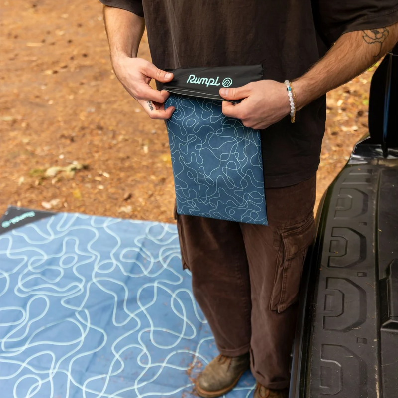 Pack Mat Large, Rumpl Pack Mat Large in Puzzled Blue case with model