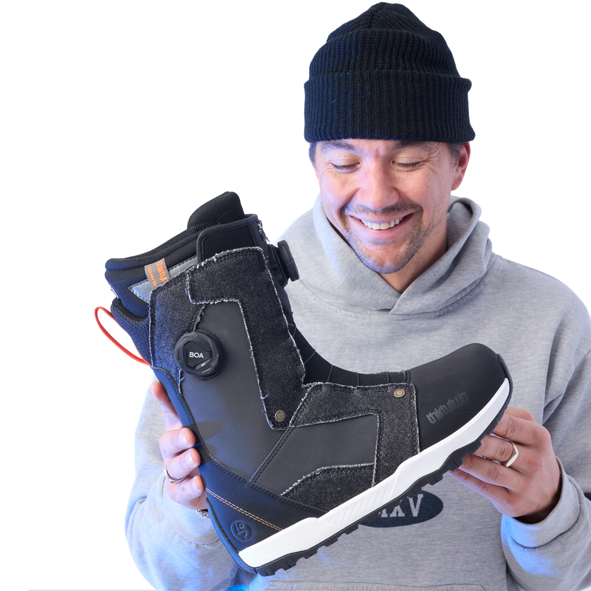 ThirtyTwo STW Double BOA Public being held by man with black beanie smiling 