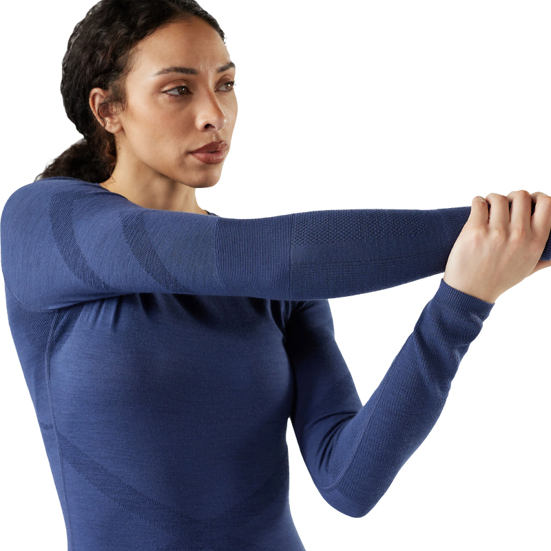 Women's Intraknit Thermal Merino Base Layer Crew, Smartwool Women's Intraknit Thermal Merino Base Layer Crew Sleeve with model stretching arm