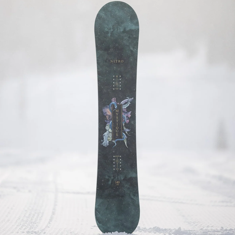 Nitro Women's Mystique standing up with snow in tail