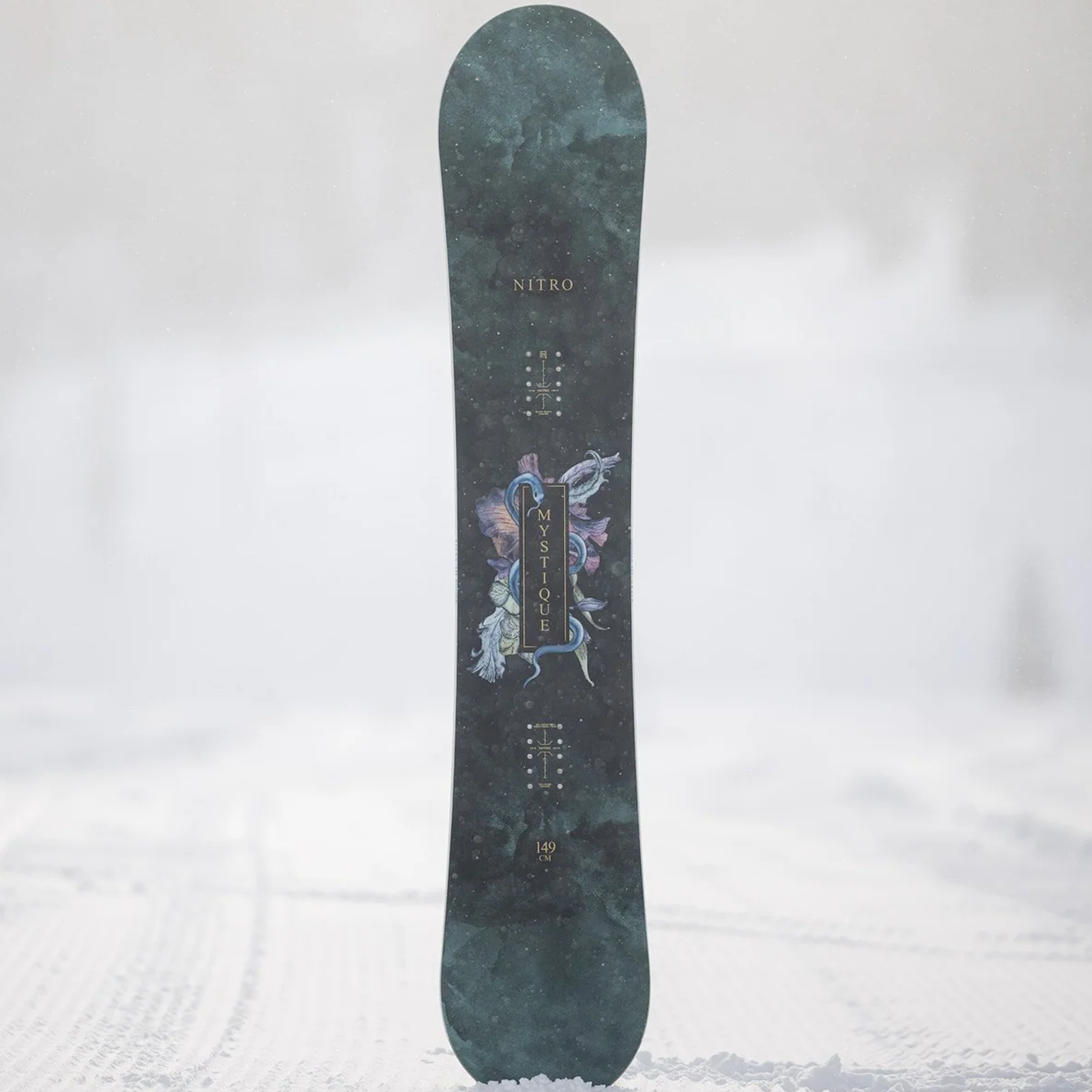 Nitro Women's Mystique standing up with snow in tail