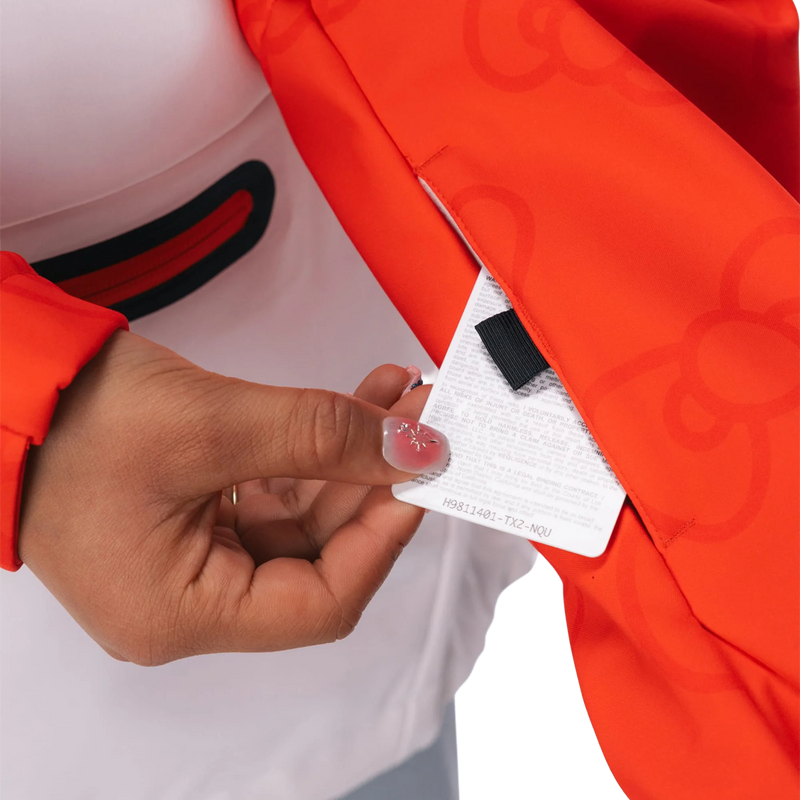 Women's Hello Kitty Waterproof Hoody, 686 Women's Hello Kitty Waterproof Hoody in Hello Kitty White Red card pocket detail