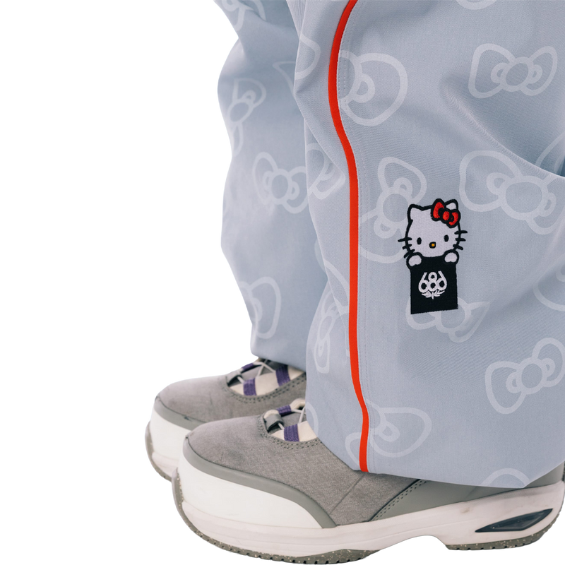 Women's Hello Kitty Lil Bow Pant, 686 Women's Hello Kitty Lil Bow Pant in Hello Kitty Denim with Hello Kittyx 686 logo detail lateral left leg