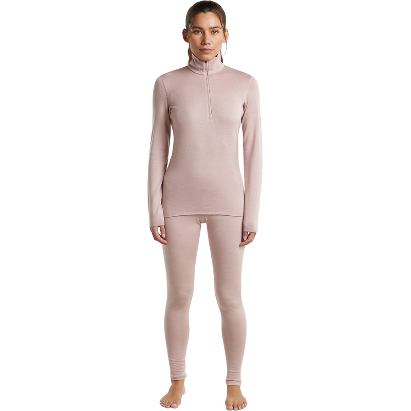 Helly Hansen Women's Merino 260 Oasis Long Sleeve Half Zip in Pink Quartz full view on model