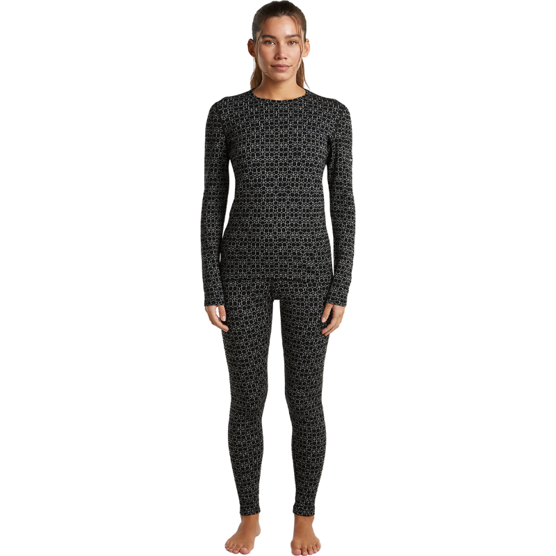 Helly Hansen Women's Merino 260 Oasis Vertex High Rise Leggings in Black Snow full view on model