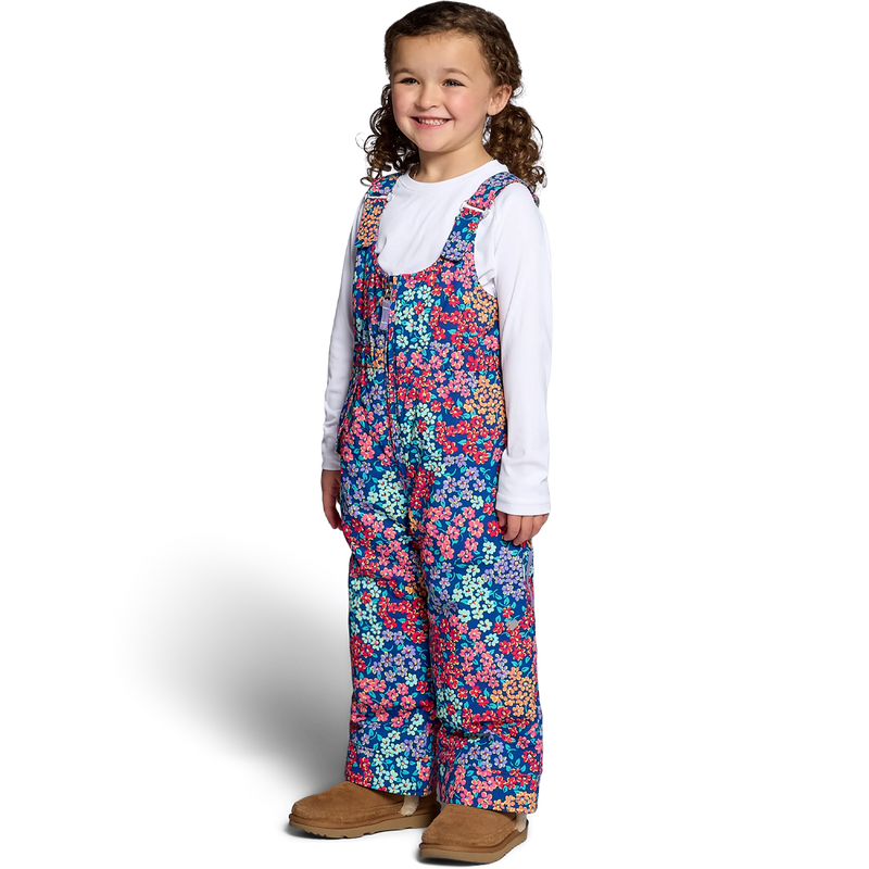 Obermeyer Youth Snoverall Print Bib Pant in Calico Mini angled on model