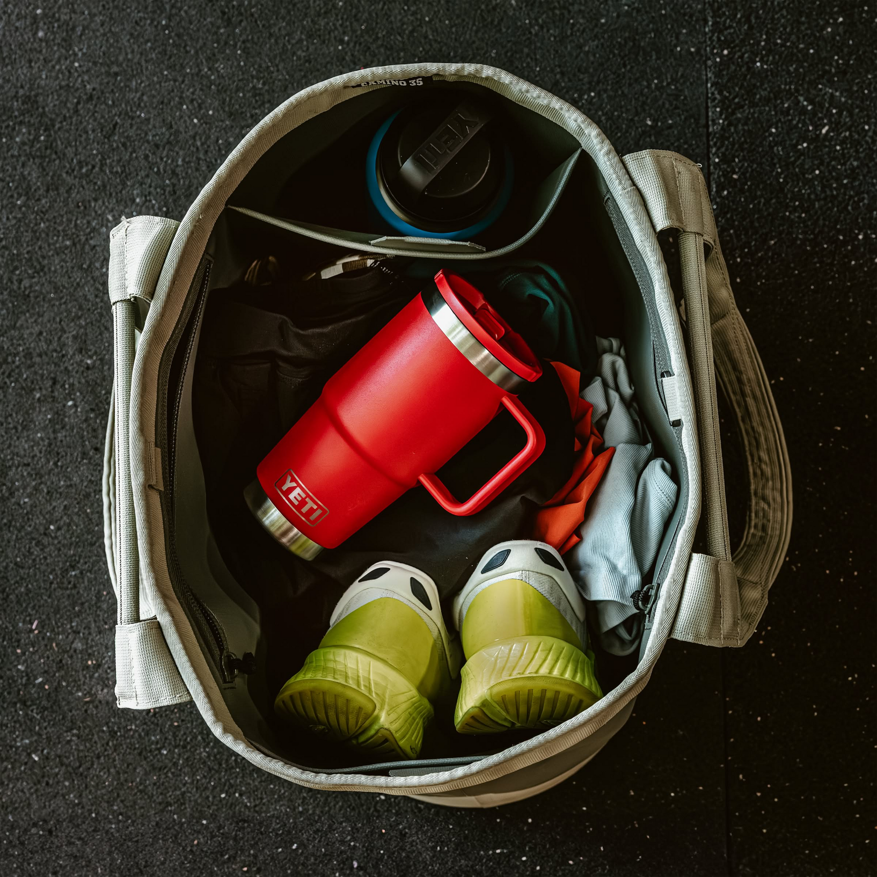 Yeti Rambler 20 oz Travel Straw Mug Lifestyle in Yeti Tote