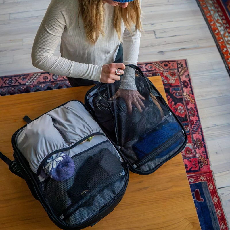Diamant Weekend Warrior 2.0 50L woman packing using mesh packing area