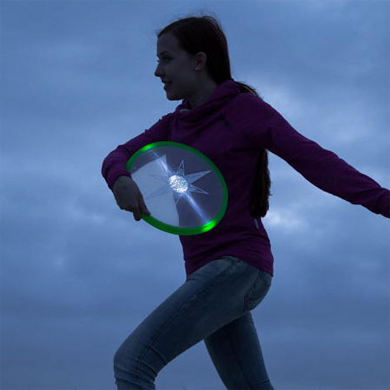 Skylighter Frisbee, HQ Kites & Designs Skylighter Frisbee lit up at night