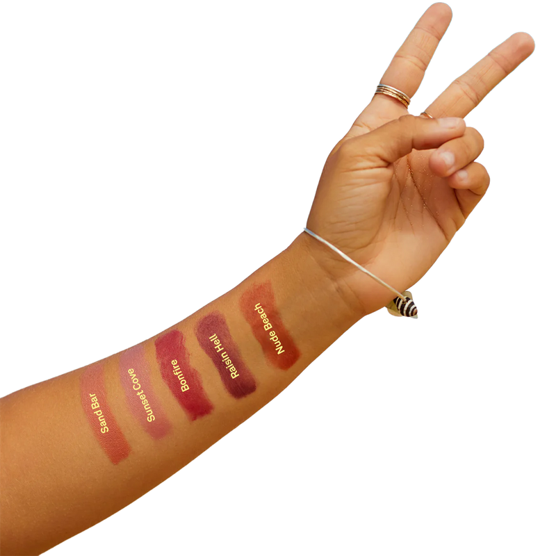 SPF 15 Tinted Lip Balm, Sun Bum SPF 15 Tinted Lip Balm displayed on model arm