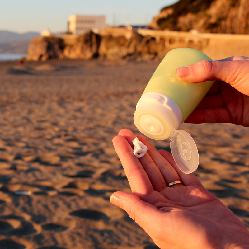 GoToob+ Squeezable Silicone Travel Bottle 1.7 oz (3 Pack), HumanGear GoToob+ Squeezable Silicone Travel Bottle  in hand
