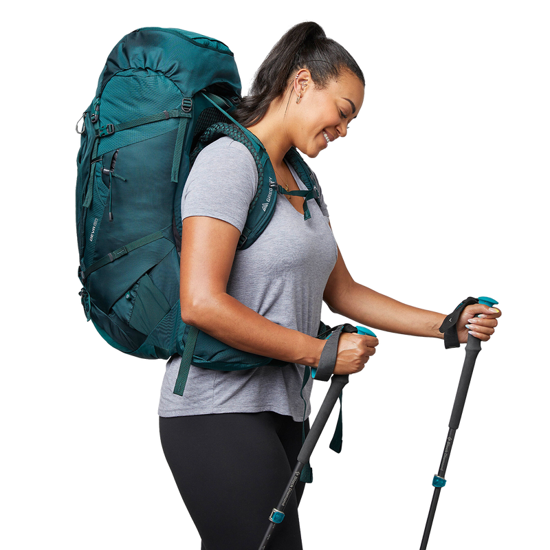 Women's Deva 60, Gregory women's Deva 60 backpack side on model.